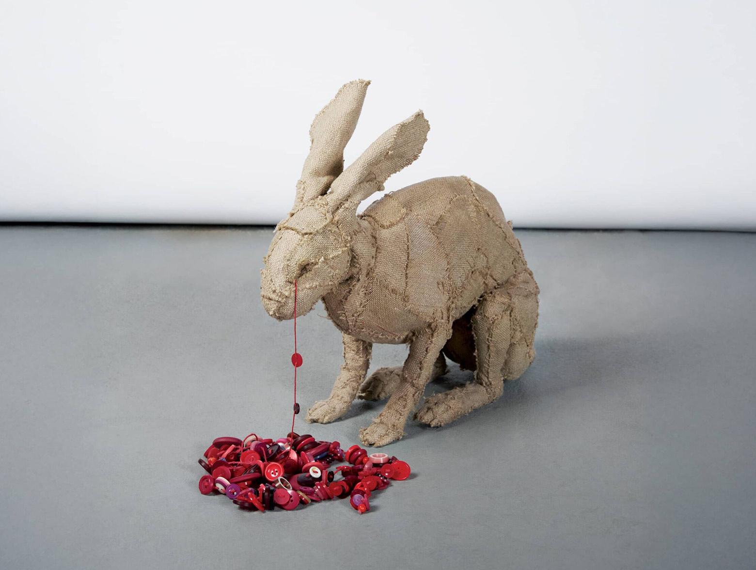 From behind the wall